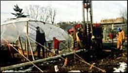 Temporary structure with plastic covering. Temporary structure with plastic covering.