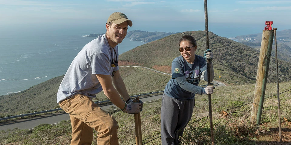 xMAHE_170116_KW-0546-2 Volunteers work on restored trails at Hawk Hill.