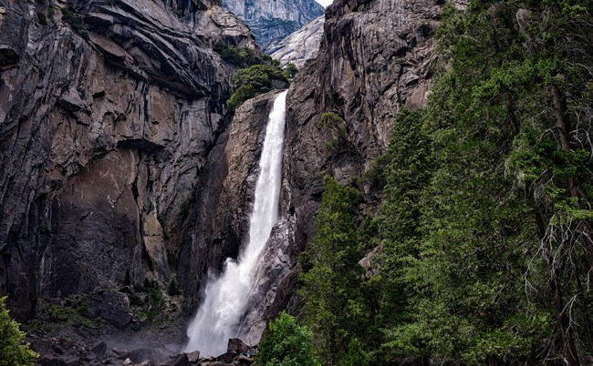 Waterfall running off a steep cliff. CC0