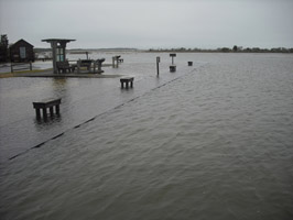 Old Ferry Landing at a storm high tide. 35kb