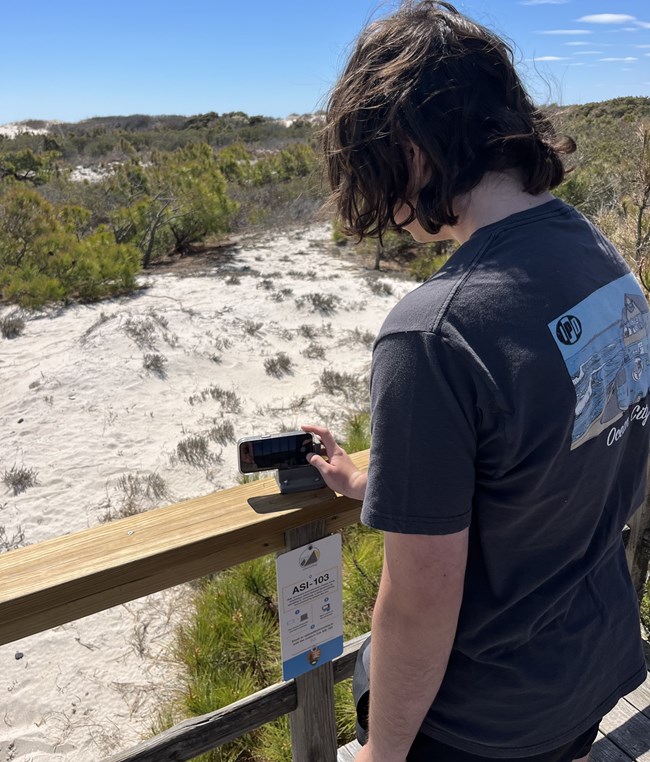A Citizen Scientist capturing a photo from Station 103