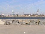 Manmade structures such as jetties built to the north of the island alter  the long shore current and inhibit sediment transport. 10 kb