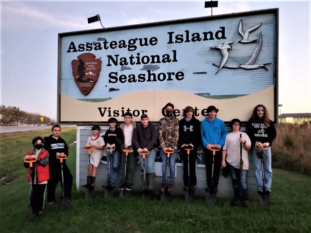 Boy Scout Troop 225 after completing service project at Assateague Island National Seashore Boy Scout Troop 225 in front of the Assateague Island National Seashore sign