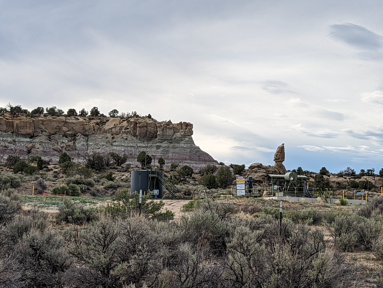 A view of sandstone (top) and shale (bottom) rock layers, as seen from NM County Road 2900.