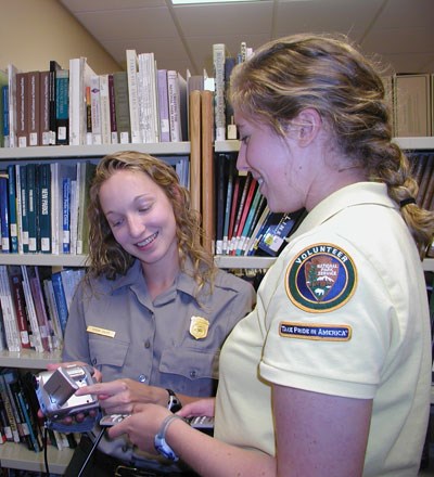 Volunteer receives training on the use of park equipment Volunteer receives training on the use of park equipment