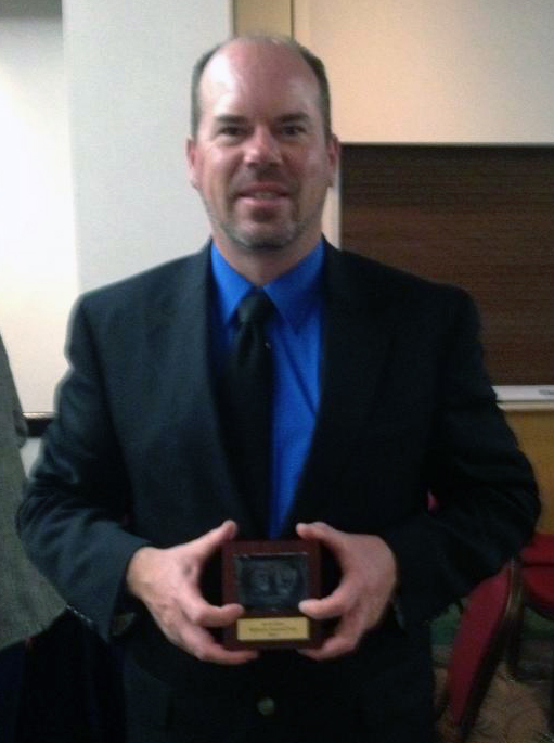 Ranger Aaron Kaye with his award