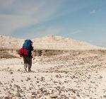 Hiker in the Badlands by Photographer Carl Johnson, 2009 Artist in Residence Hiker in the Badlands by Photographer Carl Johnson, 2009 Artist in Residence