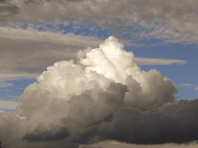 white and dark clouds mound up