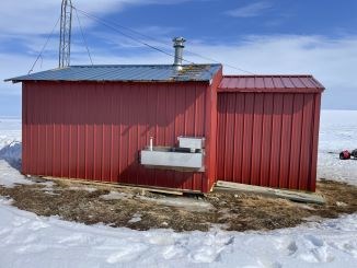 red cabin on tundra