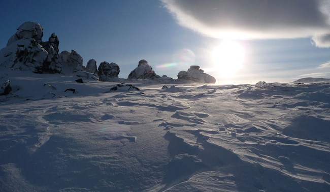 Tors surrounded by snow in Serpentine valley
