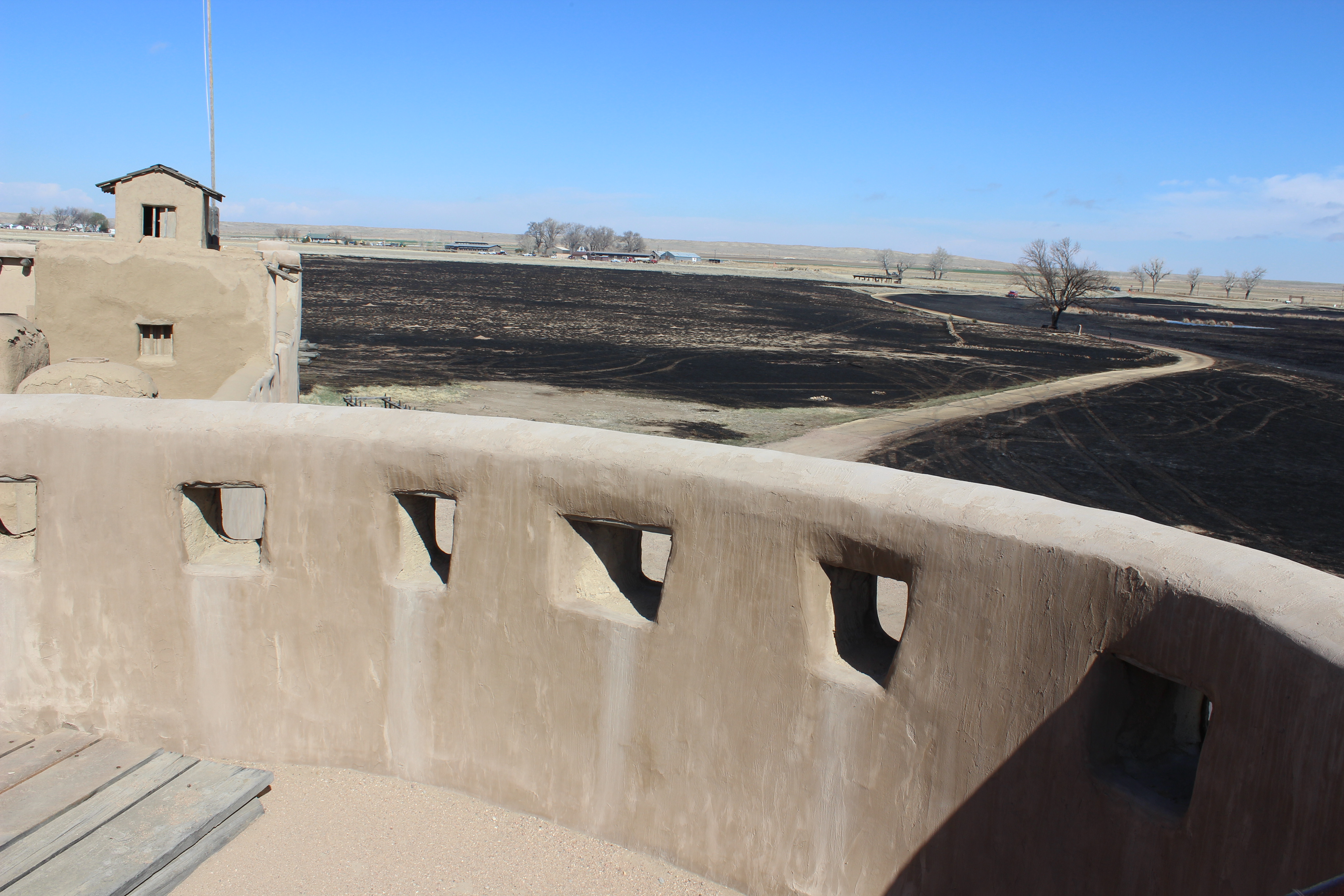 Burned area as seen from inside Bent's Old Fort on 4/13/22