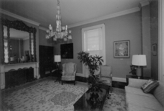 Black and white photo of the Belmont House parlor