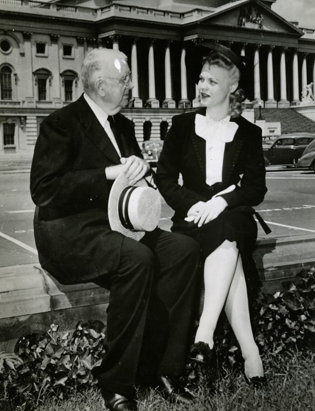NWP HQ_BEPA Lobbying for ERA cropped Man and woman seated outside with US Capitol Dome in background