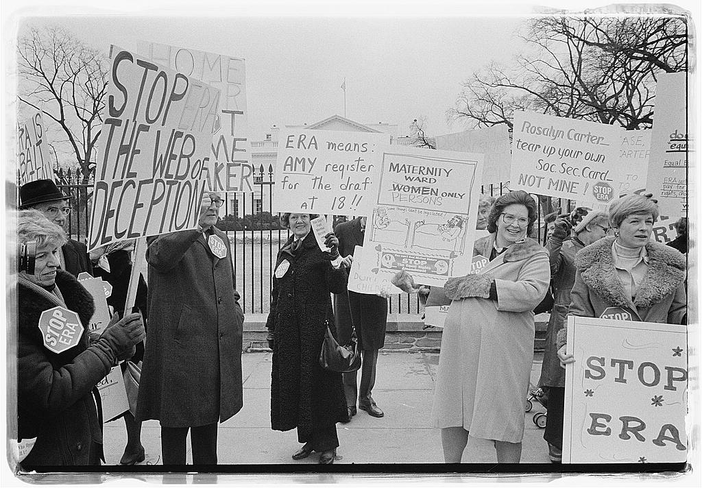 Protestors holding signs against the Federal Equal Rights Amendment gathered outside the White House