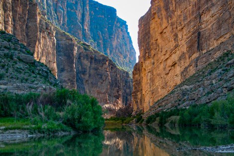 The setting sun reflects off the cliffs of Santa Elena Canyon.