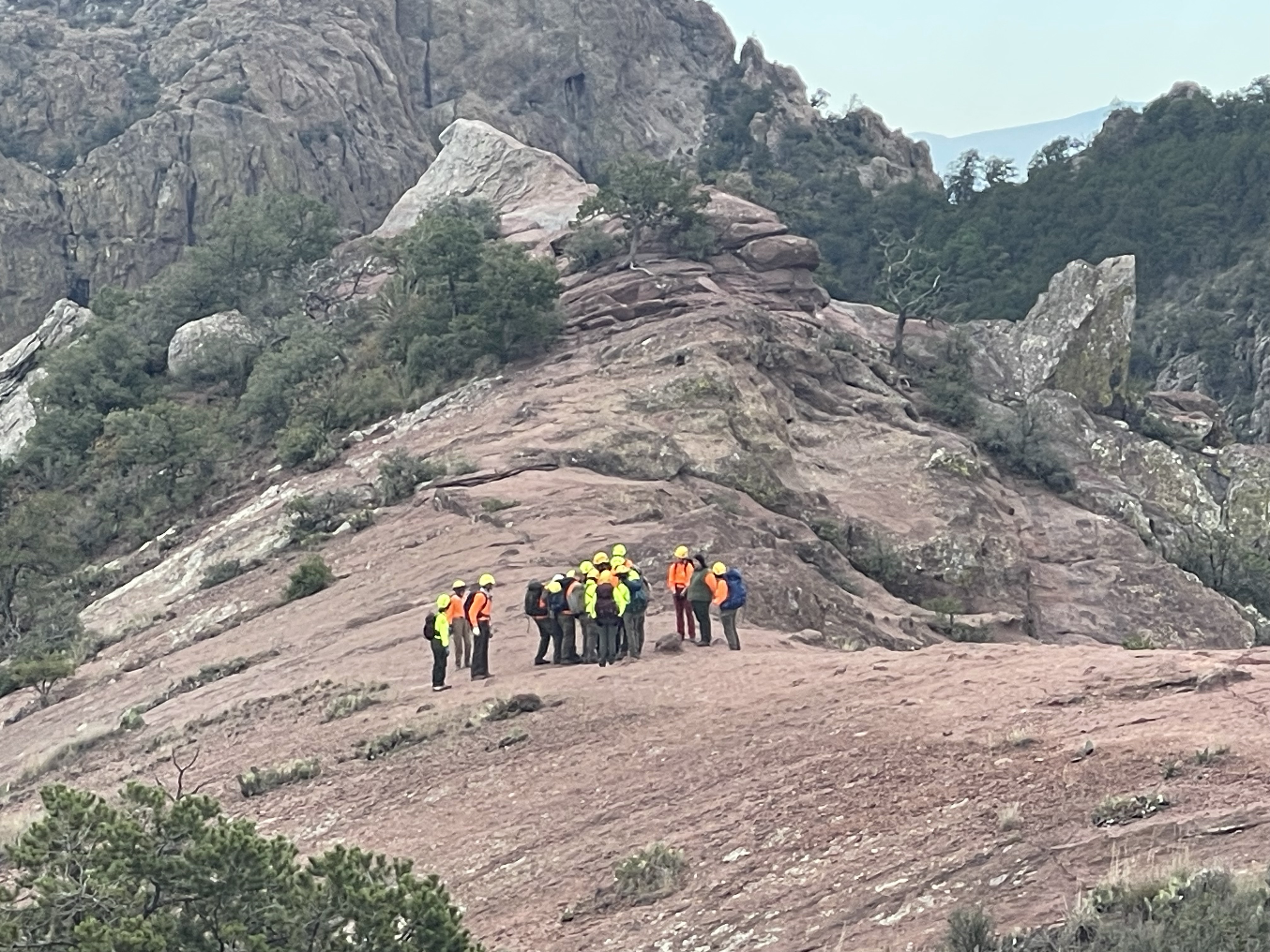 Rescuers transporting missing hiker near the summit of the Lost Mine Trail