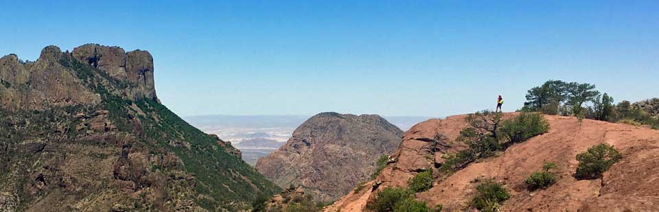 Hiker enjoying the vast views of Big Bend