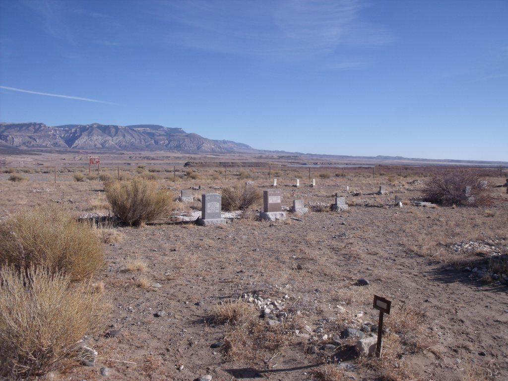 Kane/Iona Cemetery with the Bighorn Mountains in the distance