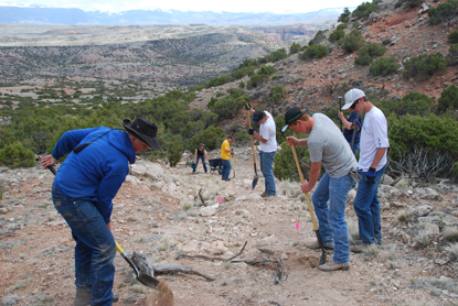 Lovell FFA Students help park staff reclaim old road scar. Lovell FFA Students help park staff reclaim old road scar.
