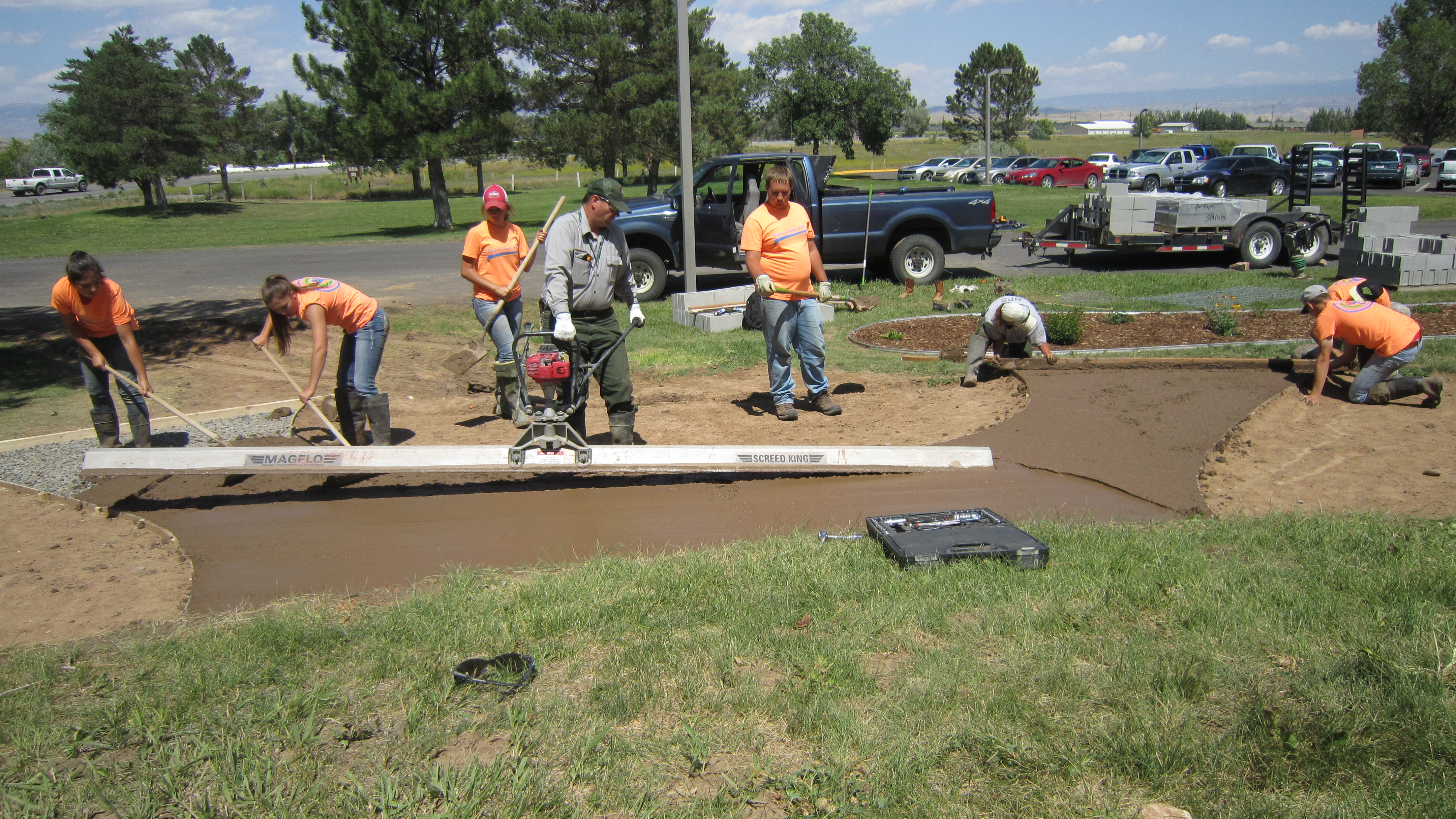 2016 YCC crew putting in the sidewalk for the flower beds at the Visitor Center.