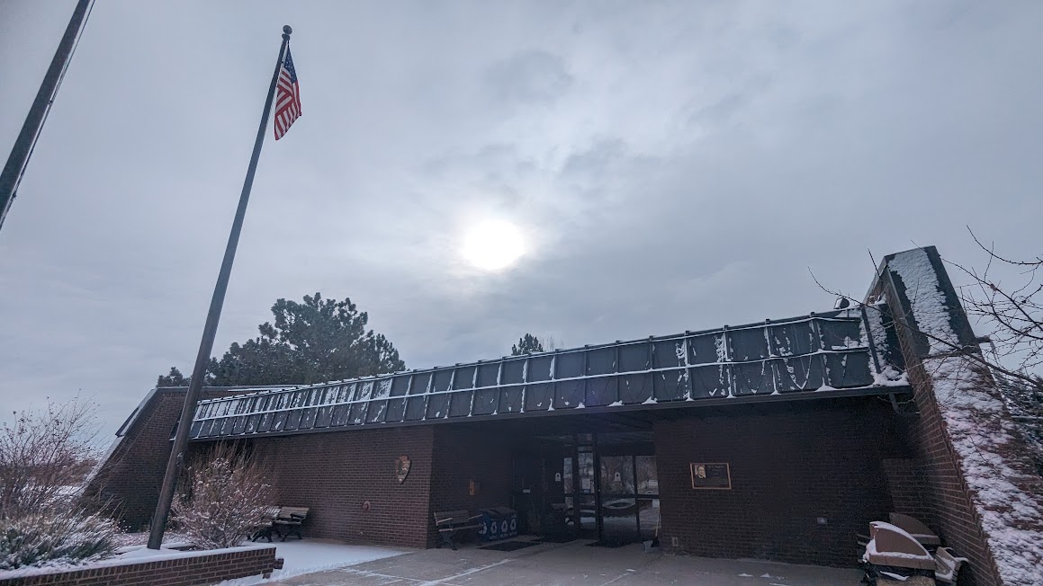 The Lovell Visitor Center covered in snow during the winter.