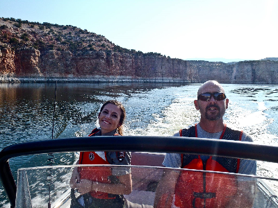 Two rangers on the water at Medicine Creek