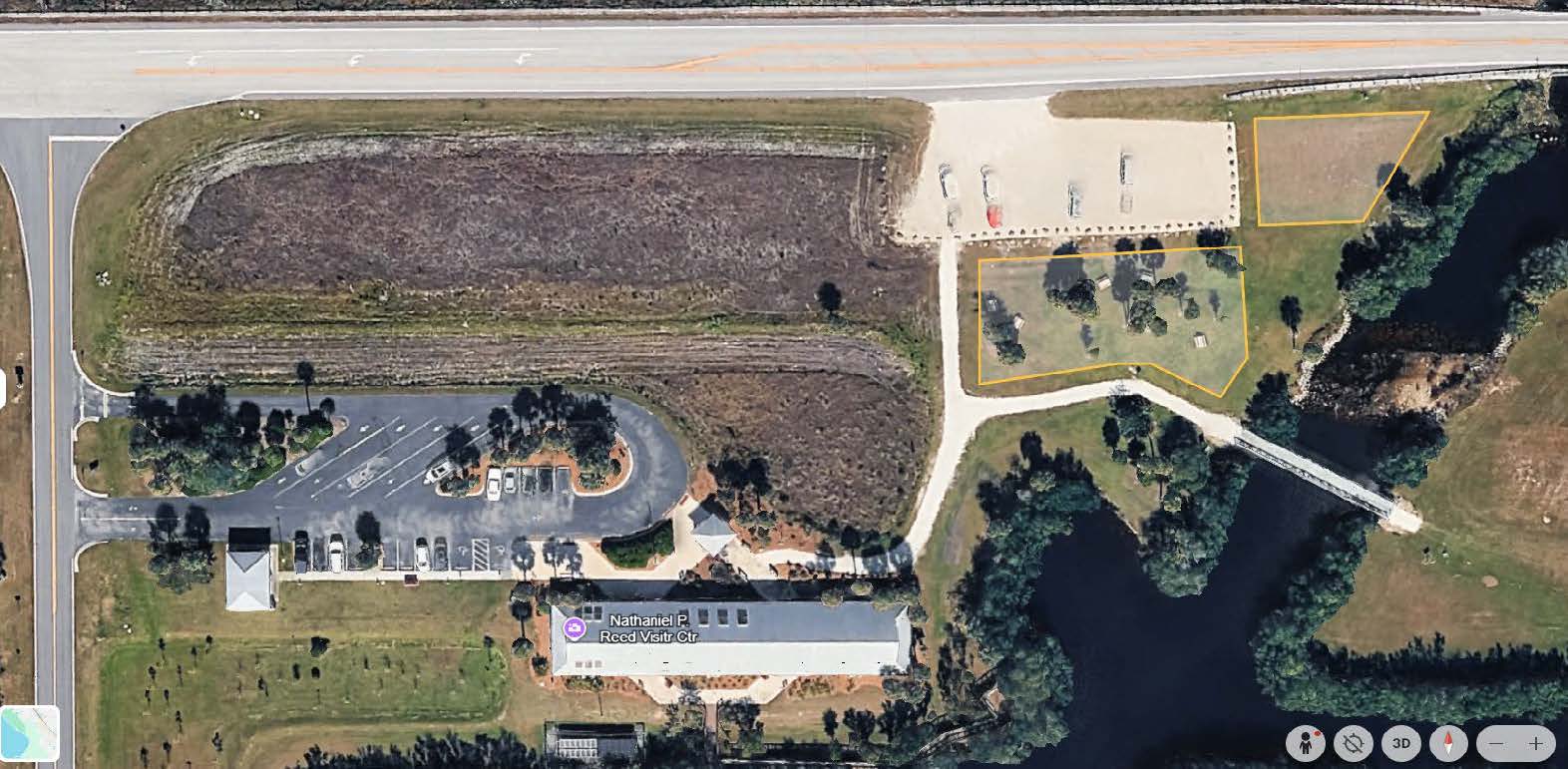 Two polygon-shaped areas northeast of the visitor center and near the northern parking area. One is an area directly south of the parking area and the other is directly east.
