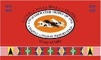 A red flag with three horses running in the center of it.