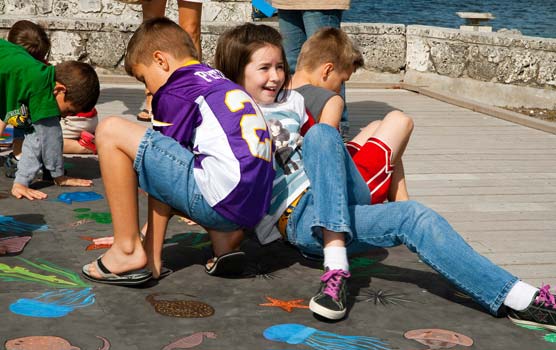 Participants in last year's Family Fun Fest play Defense Twister.