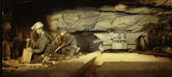 Mining display at Blue Heron showing a hand loading operation