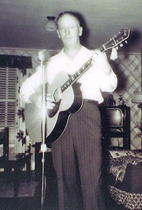 Playing guitar inside one of the houses at Blue Heron.