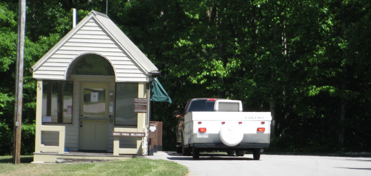 Visitor paying at a campground kiosk Visitor paying at a campground kiosk