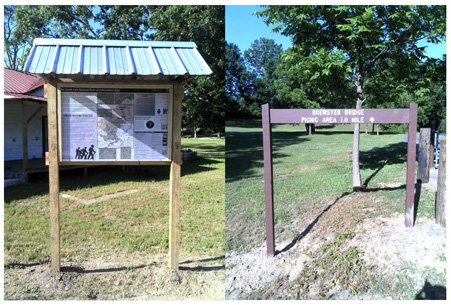 Brewster Trailhead with bulletin board and trail sign