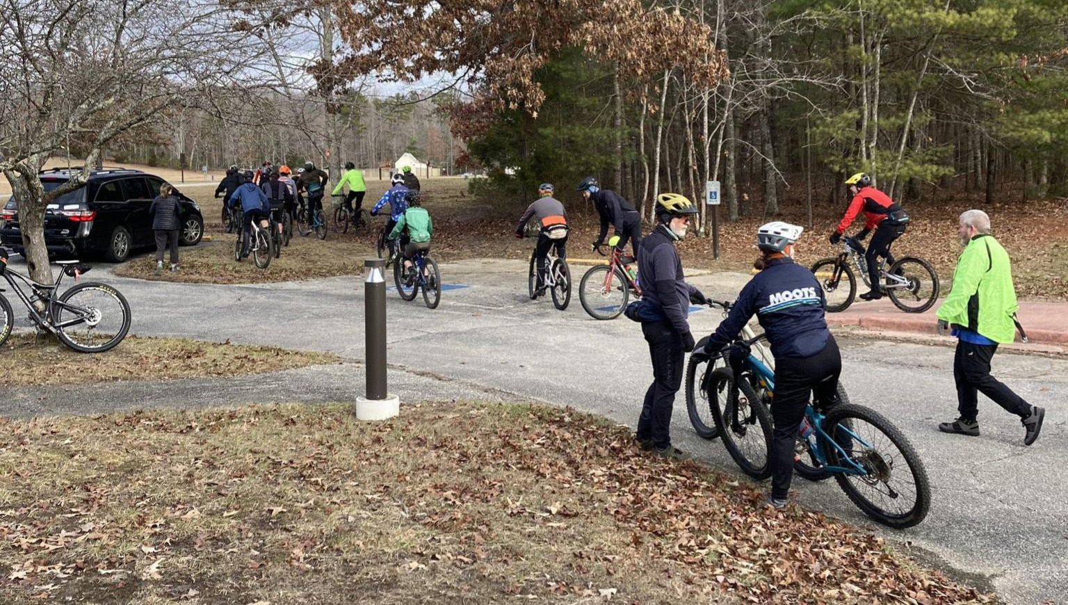 Mail Run 2024 Groups of mountain bikers taking off in waves.