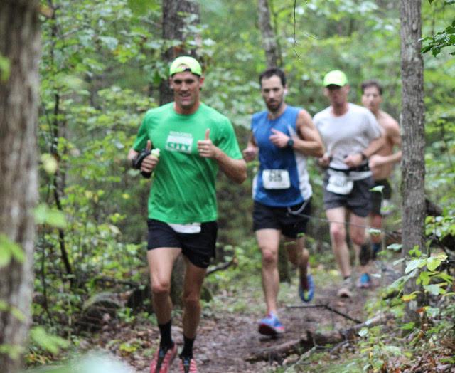 Visitors Trail Running in Park Visitors Trail Running in Park