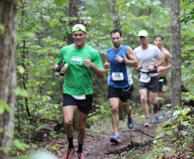 Visitors Trail Running in Park