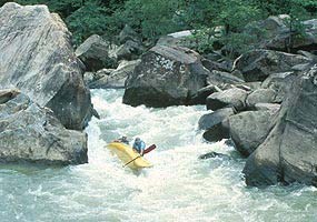 Canoe overturning at Devils Jump Rapids on Big South Fork River.