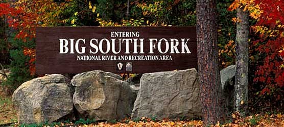 Big South Fork entrance sign with fall colors in background.