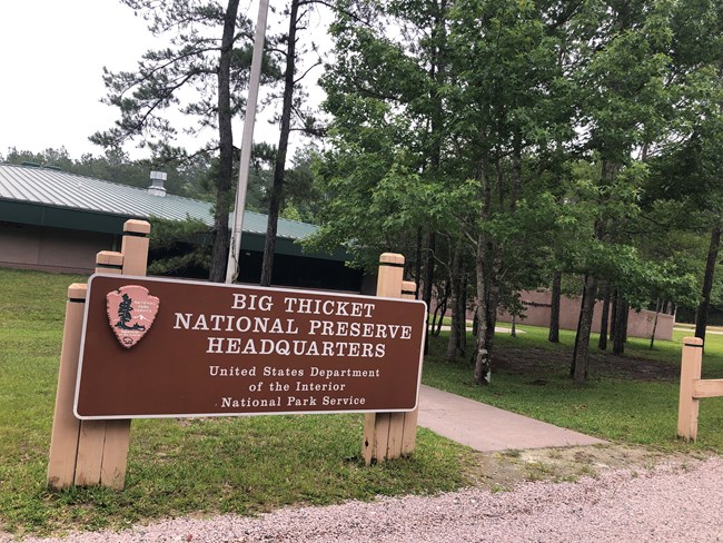 brown sign outside the park headquarters