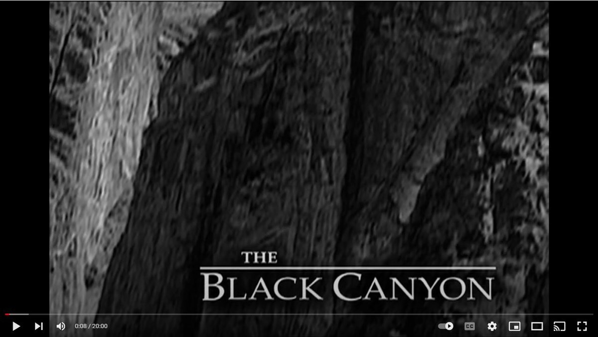 Youtube player with "The Black Canyon" over canyon wall