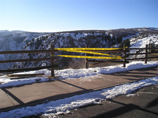 broken fence at tomichi point