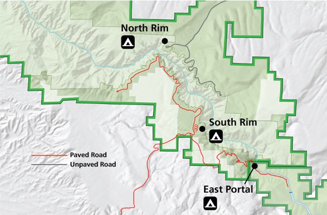 A map showing green highlighted area of the park and black tent icons where campgrounds are