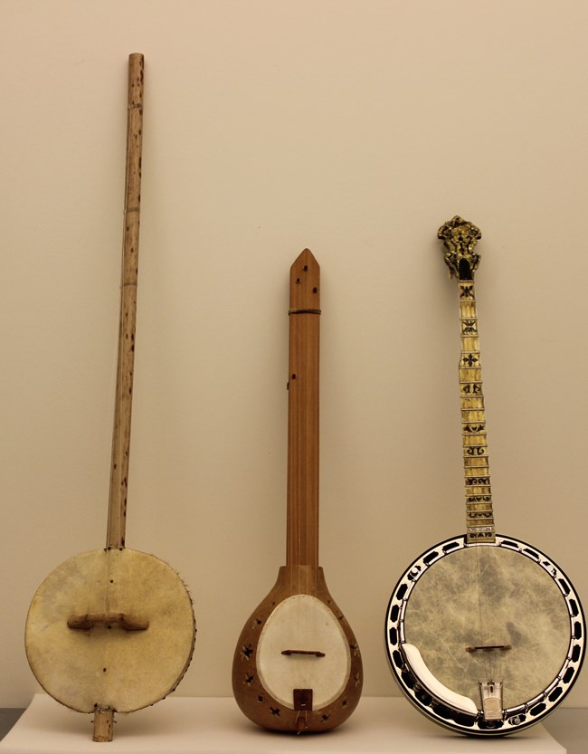 Three banjo-style instruments, including an akonting