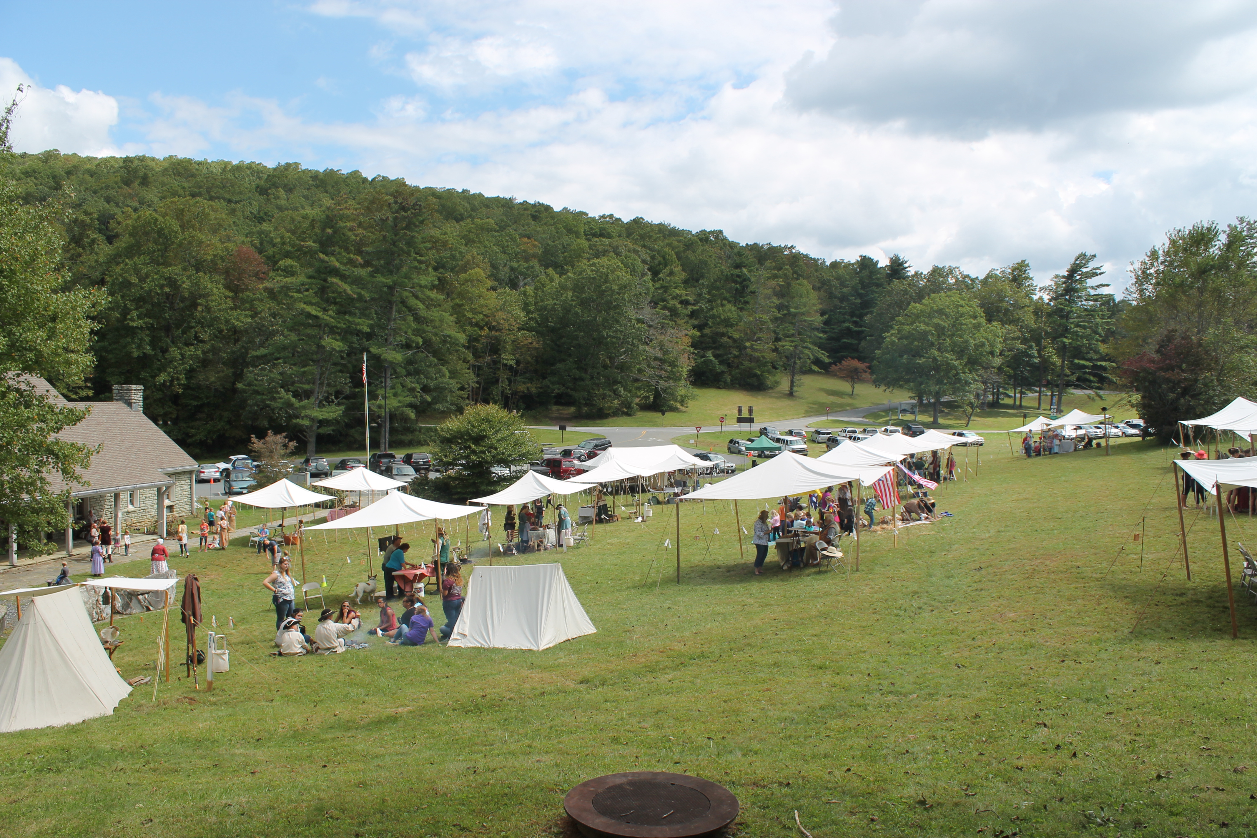 Period demonstration and encampment tents cover the grounds of Museum of NC Minerals.