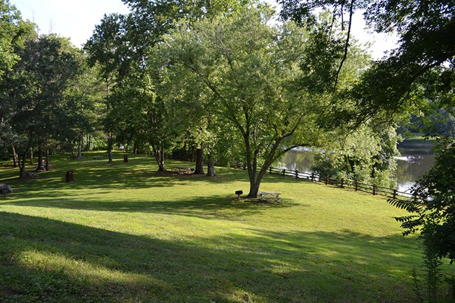James River - Milepost 63.7 - Blue Ridge Parkway (U.S. National Park Picnic tables on a grassy knoll with shady trees - James River - Milepost 63.7 - Blue Ridge Parkway (U.S. National Park