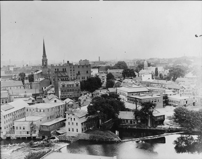 Aerial photograph of Pawtucket, showing buildings including Slater Mill