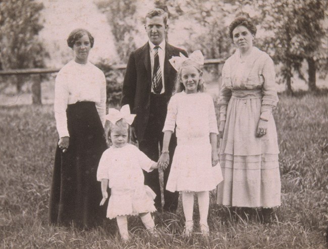 Family posing for photograph
