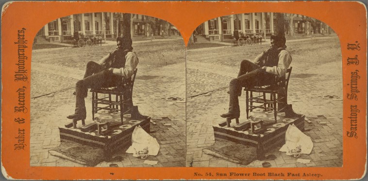 a photo of a man asleep in a chair