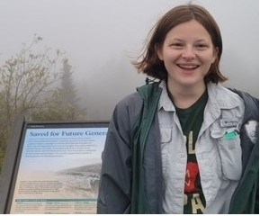 Delaney_resized Woman standing in front of wayside on foggy day