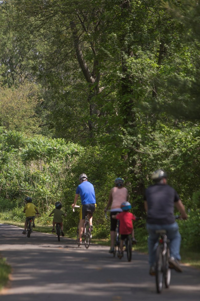 Family bikes down bikeway